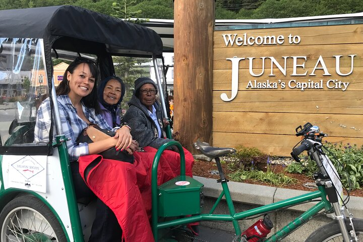 The "Welcome to Juneau" sign is part of every tour.